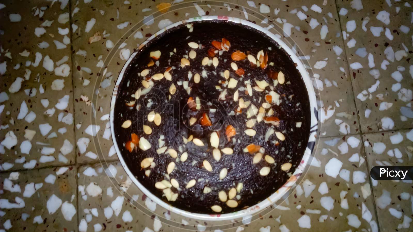 Top view of Birthday cake with nuts