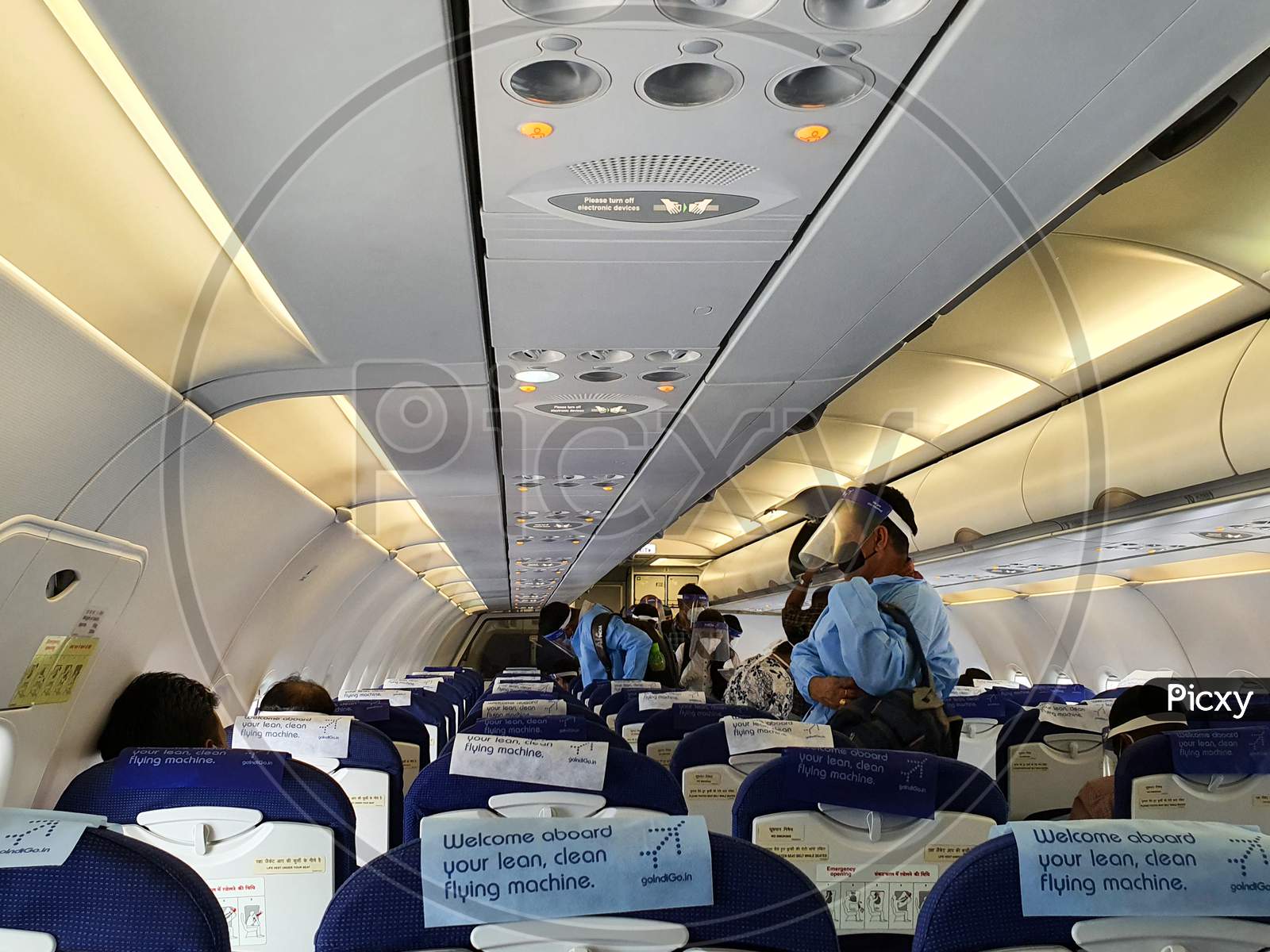 6Th June 2020- Netaji Subhas Chandra Bose International Airport, Calcutta, India-Passengers In Protective Gear Inside An Indigo Flight As Flight Services Resume Post Lockdown In India