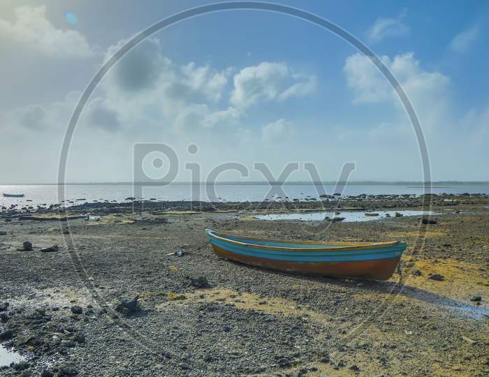 View From Diu-Una Highway (Ghoghola), Diu India. A Beautiful Tiny Island The Powerful Draw Is Its Untouched Scenic Beauty. A Boat On The Beach