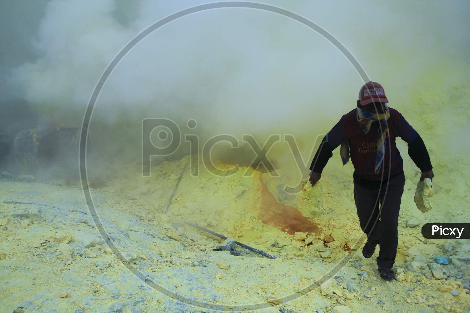 Sulfur miners in the Ijen crater