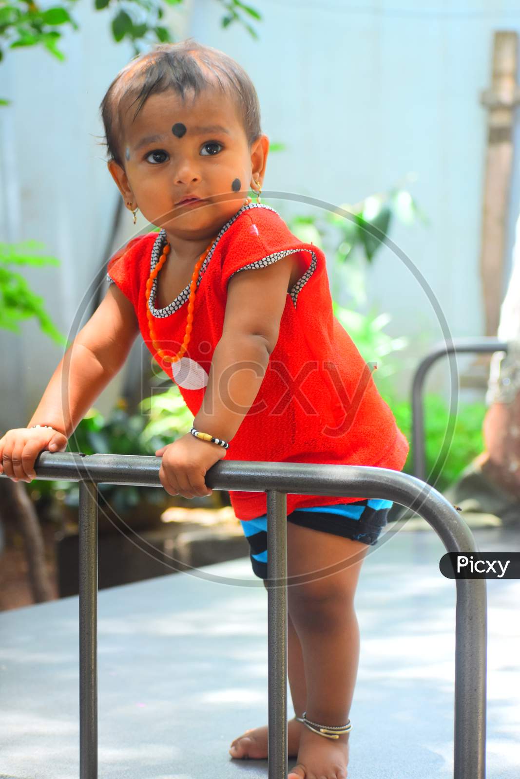cute baby in red dress