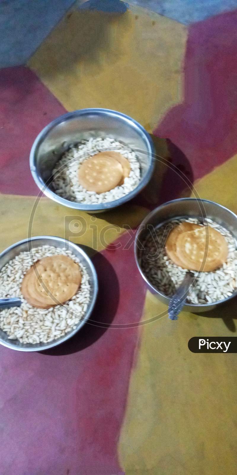 Indian breakfast, tea biscuits fridge rice mudi