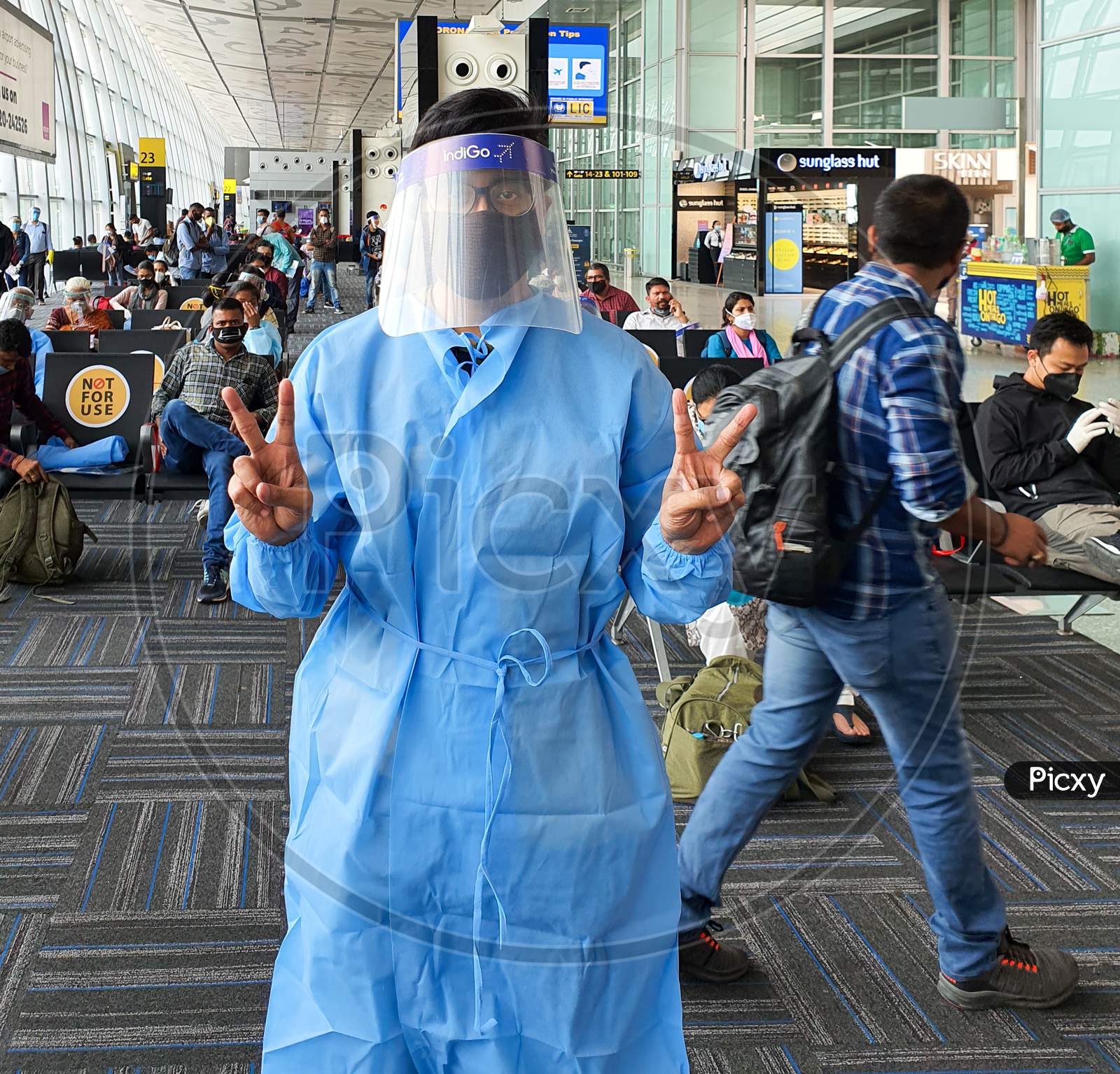 6Th June 2020- Netaji Subhas Chandra Bose International Airport, Calcutta, India-A Traveller Wearing Full Body Suit And Face Shield Provided By Indigo Airlines At Calcutta Airport