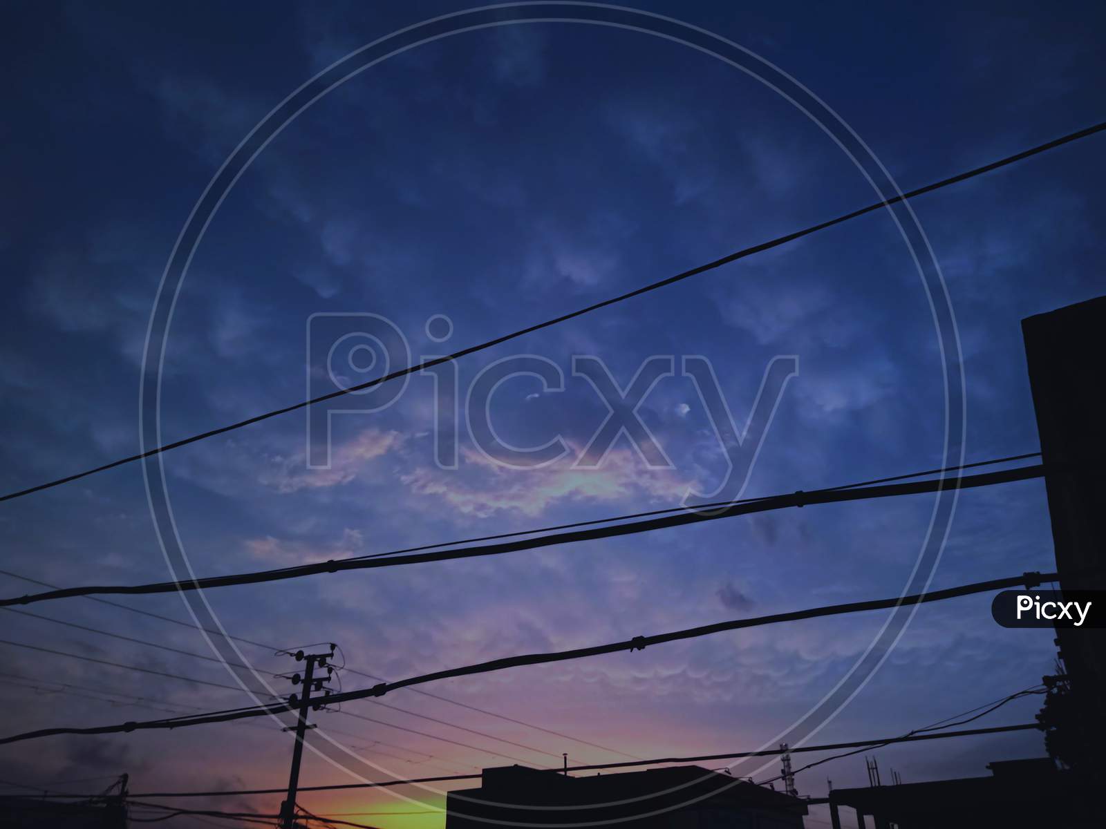 Beautiful sky background with overhead power line