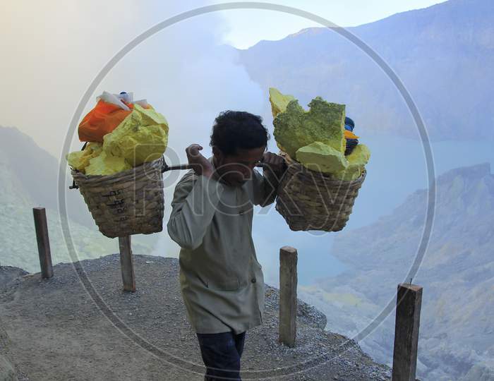 Sulfur miners in the Ijen crater