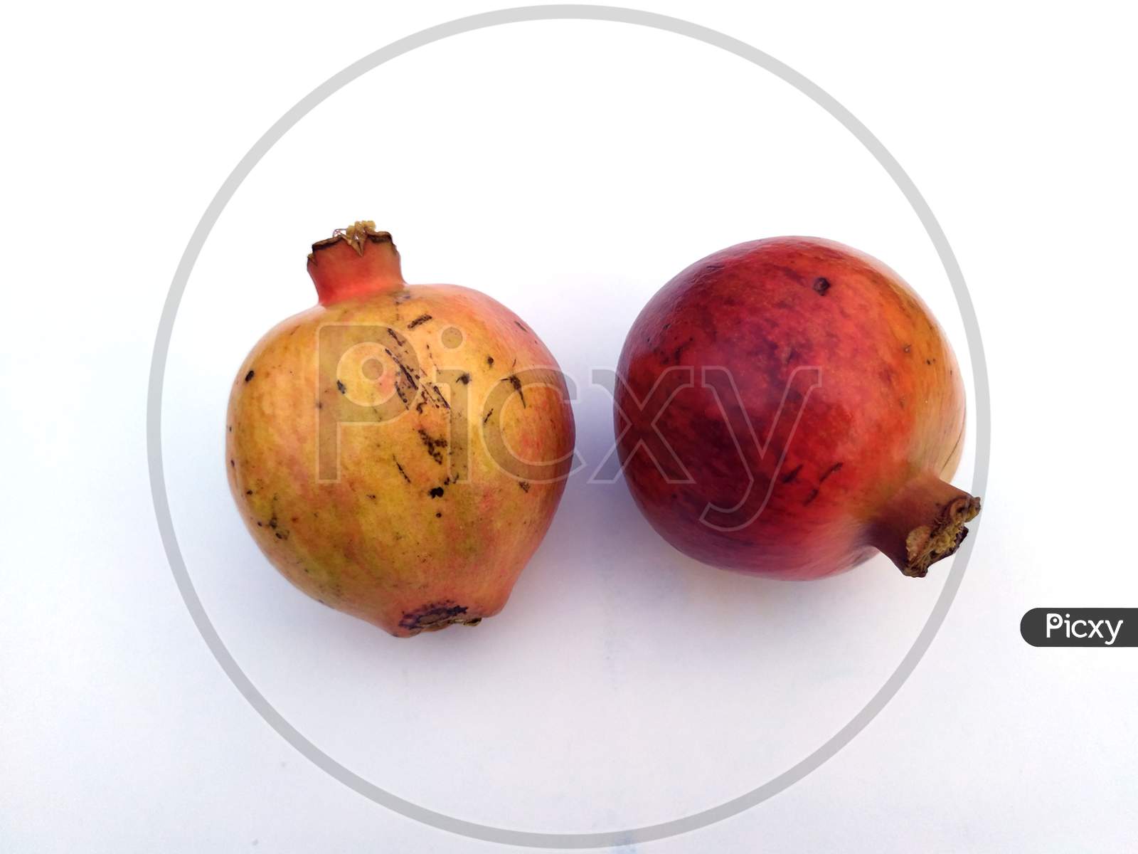 fresh healthy sweet pomegranate isolated on white background