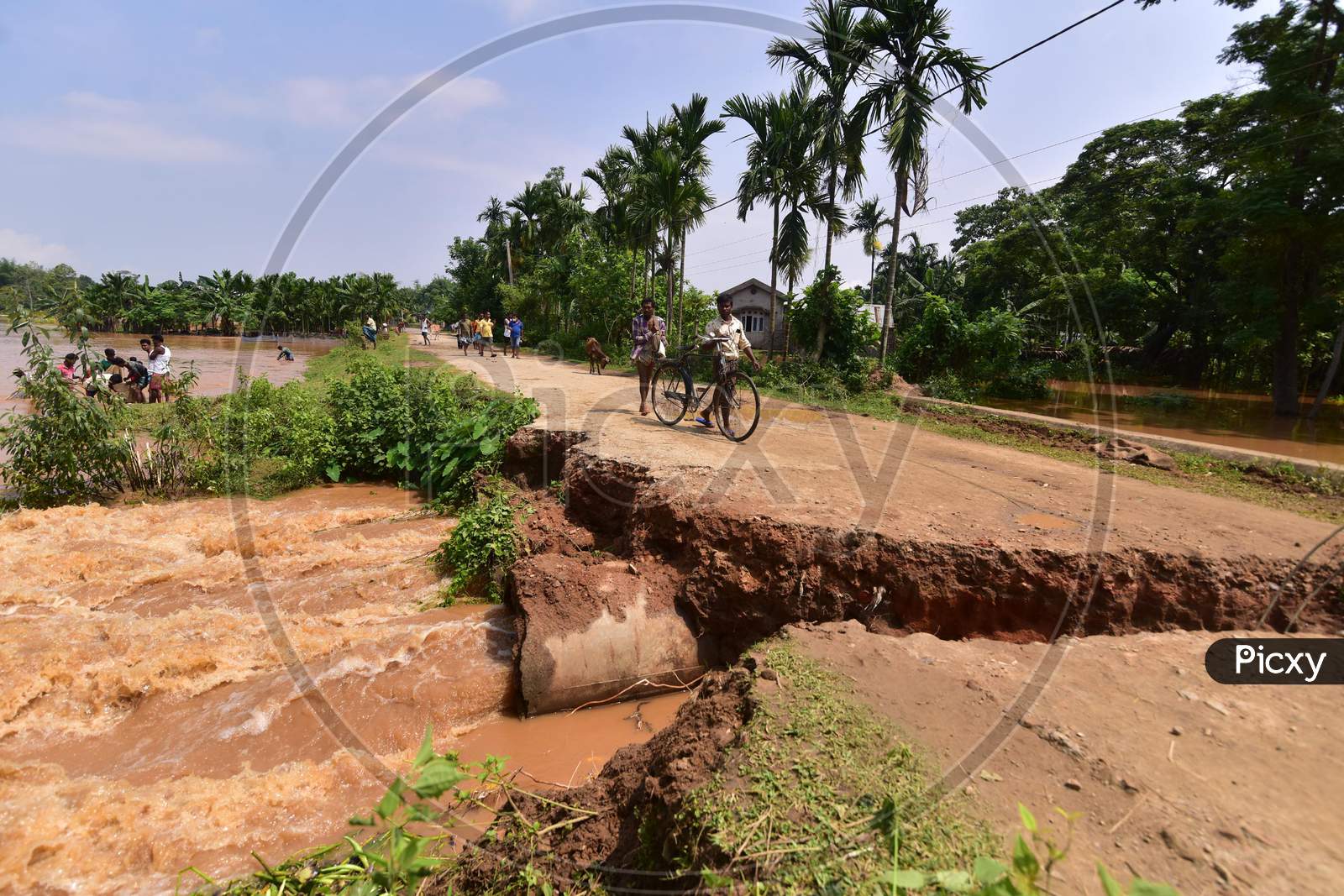 A damaged Road At Flood Affected area at  Pramila Village Near Kampur In Nagaon District Of Assam On June 7,2020