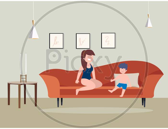 Woman Sitting With Her Son In A Room