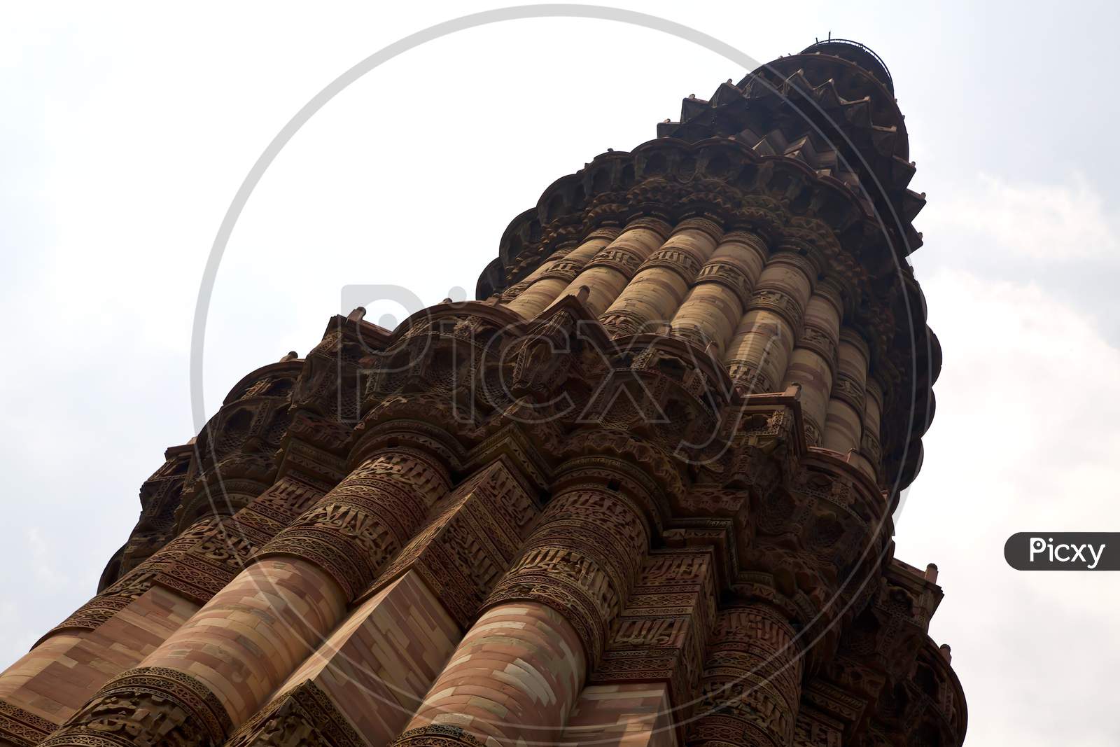 The Qutub Minar Is A 73-Metre Tall Tapering Tower Of Five Storeys In India. Looking Up At The Qutub Minar Can Make You Feel A Bit Dizzy.