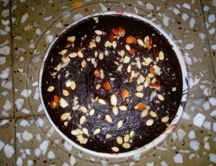 Top view of Birthday cake with nuts