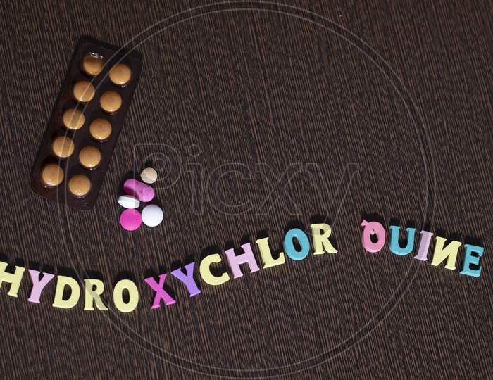 hydroxychloroquine written with Plastic Letters