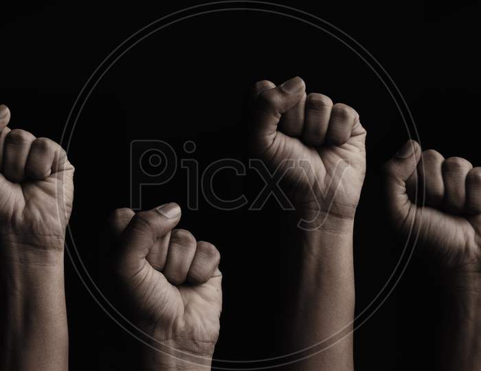 Concept Against Racism Or Racial Discrimination By Showing With Hand Gestures Fist Or Solidarity