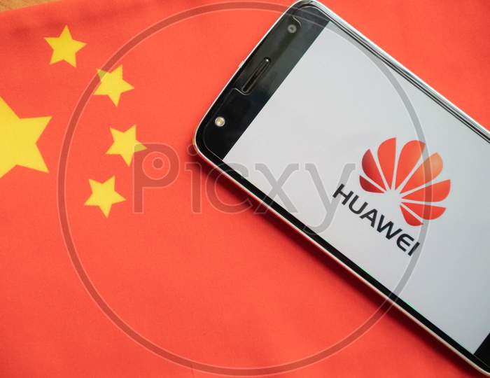 Bangalore, India, June 4, 2019 : Huawei Logo In Mobile On Chinese Flag.