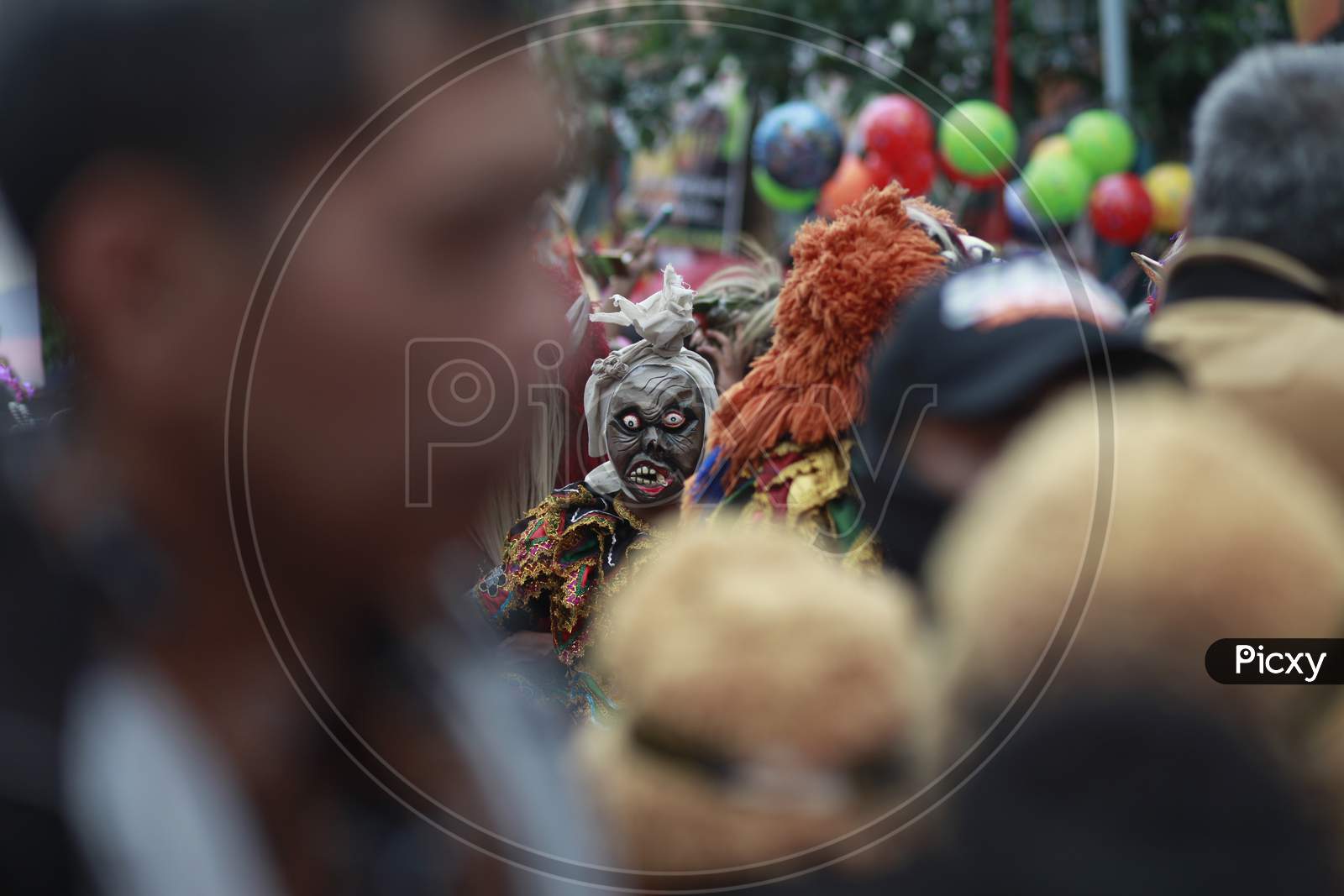 Indonesian ghost mask commonly called Pocong in a cultural carnival