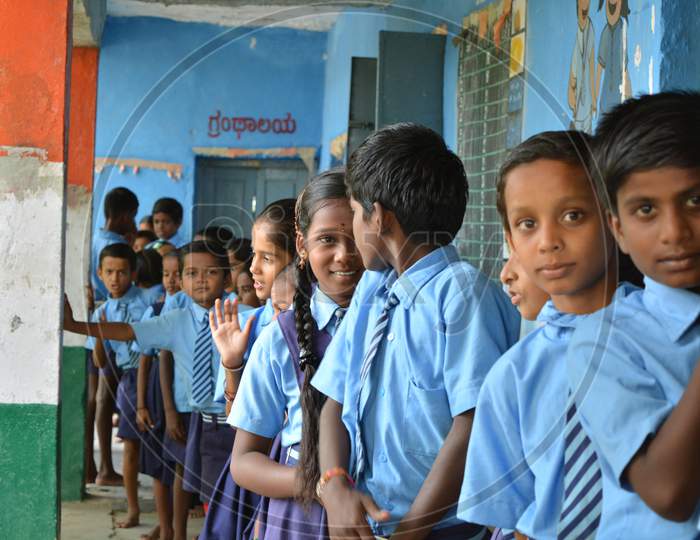 Government School Children Having Fun While Standing In Queue