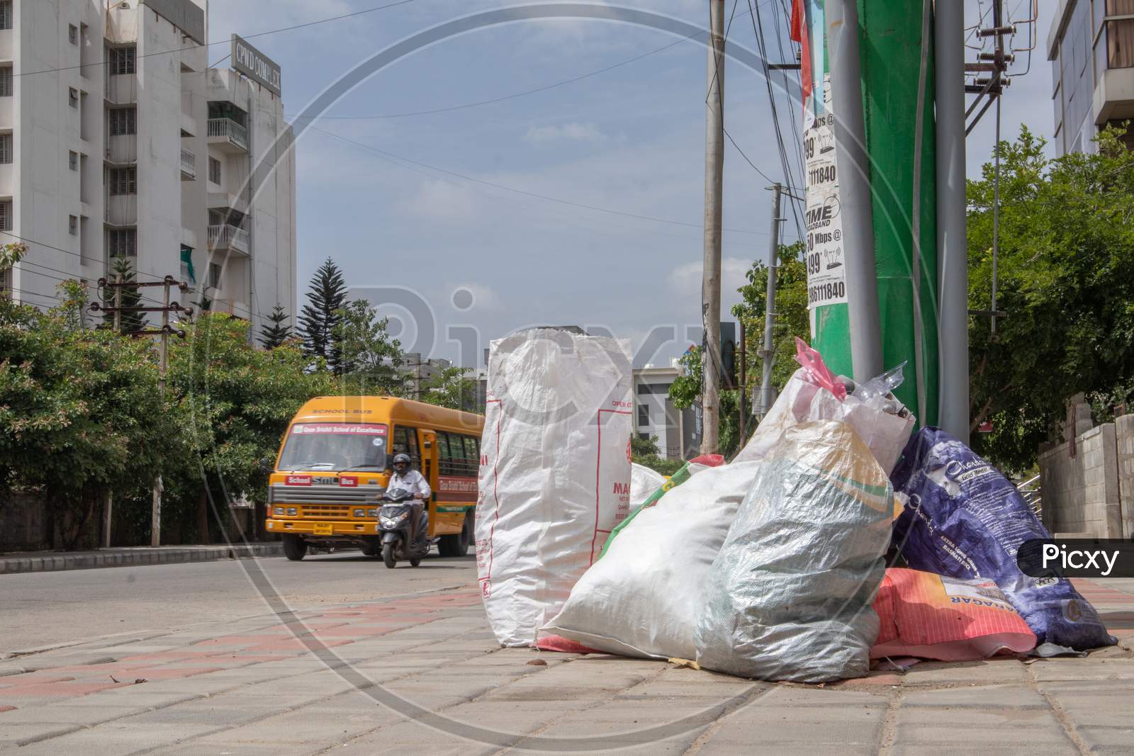 Bengaluru, India June 27, 2019 : Bags Of Rubbish Lie On The Footpath Of The Road. A Bunch Of Trash Thrown On The Road, Environmental Pollution. Garbage Problem At Bengaluru, India