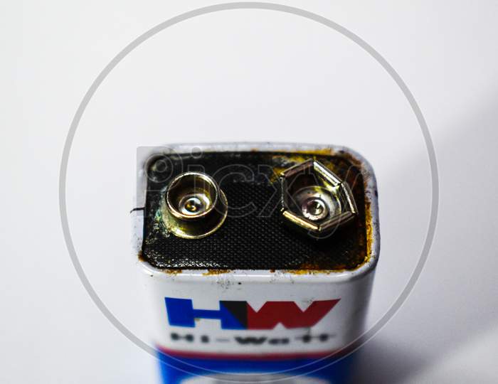 07/06/2020- Kerala,India: Close-Up Of An Old Leaked 9V Dry Cell Battery Of Hw Brand On White Background. Selective Focus Applied.