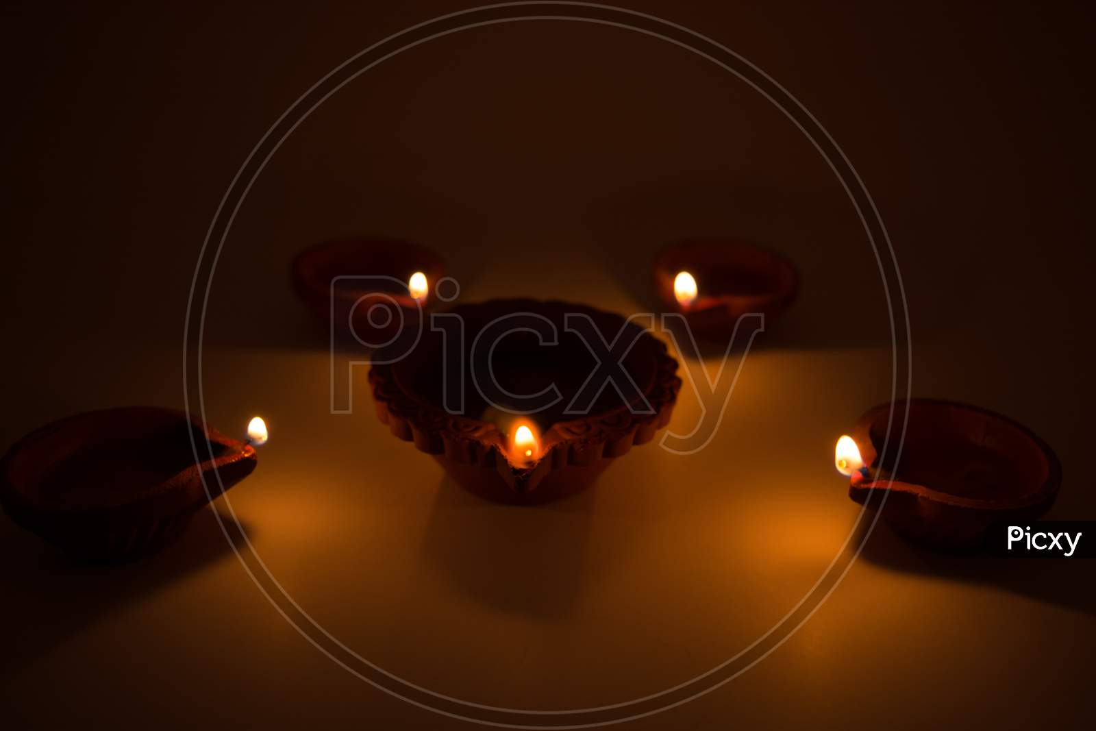 Diwali Terracotta Diyas On Dark Background Which Are Used Lighting Up The House During Diwali Times.