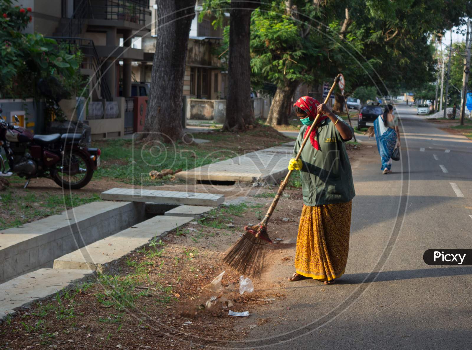Health worker cleaning the streets at Mysore