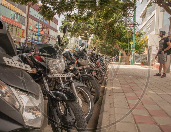 Bengaluru, India June 17, 2019 : A Lot Of Motor Scooters Parked In A Row On Road At Bengaluru, India