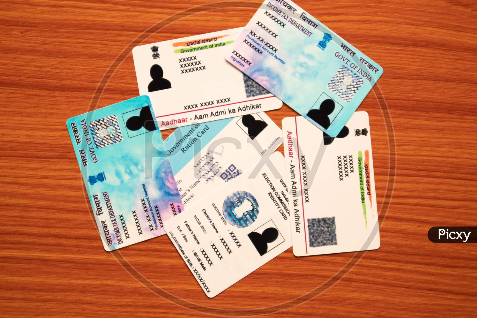 Aadhaar Card, Ration Card, Voter Id And Pan Card Which Is Issued By Government Of India As An Identity Card.