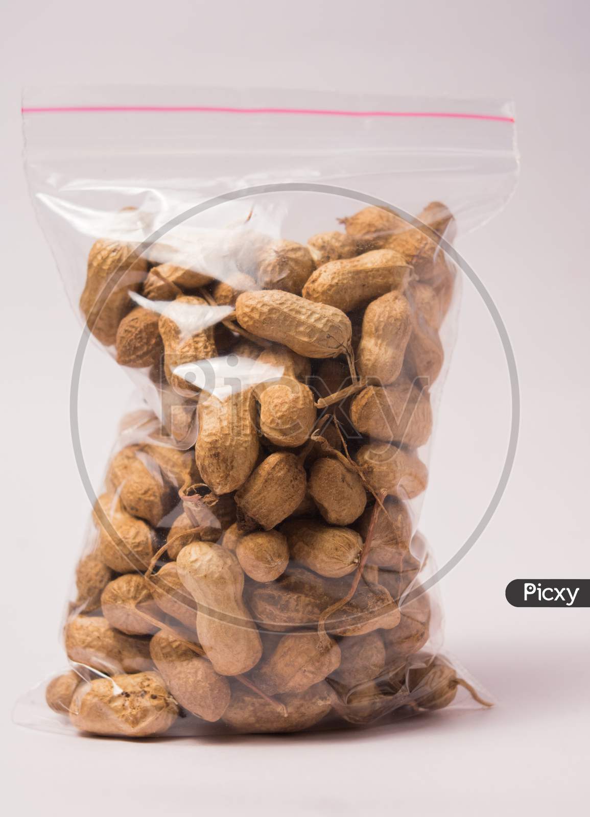 Groundnuts Packed In Plastic Bag On Isloated Background