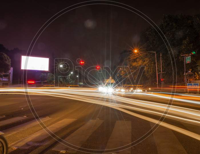 Bangalore, Karnataka India-June 04 2019 : Blank Billboard On The Highway During The Night With City Background With Clipping Path On Screen.- Can Be Used For Display Your Products Or Promotional