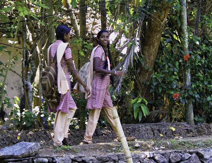 Alleppey, India - March 11, 2014: Girls In Uniform Going Home After School In Rural Part Of Southern India