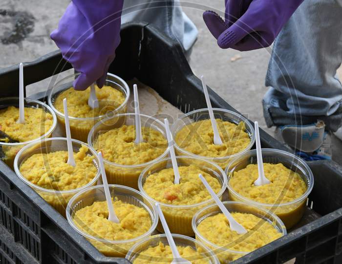 Migrant workers stranded in other states due to lockdown in the emergence of Novel Coronavirus (COVID-19) are being provided food by the Burdwan municipality after returning to their home states.