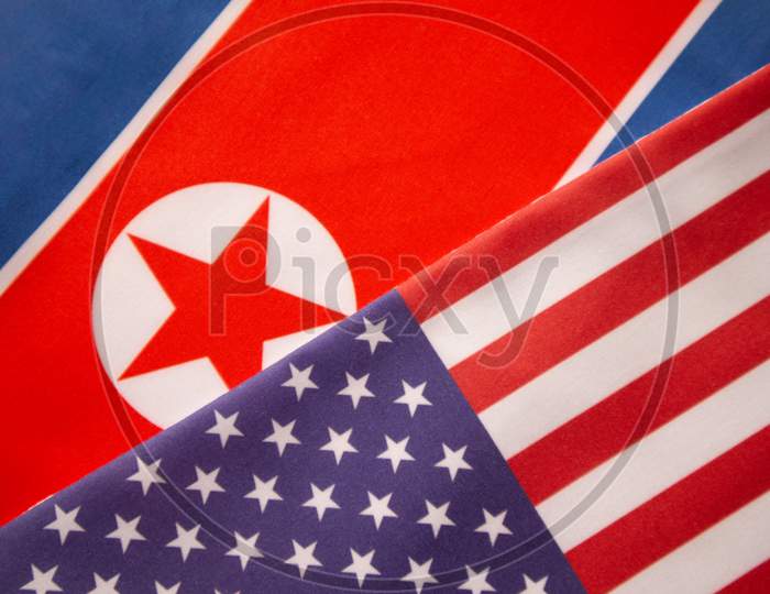 Concept Of Bilateral Relationship Between Two Countries Showing With Two Flags: United States Of America And North Korea.