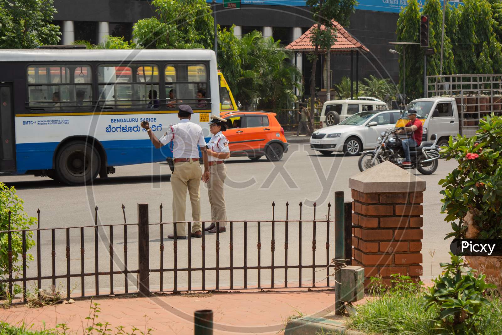 Bangalore, Karnataka India-June 04 2019 :Moving Traffic Near Town Hall Circle And City Traffic Police Busy At Work In Bengalore.