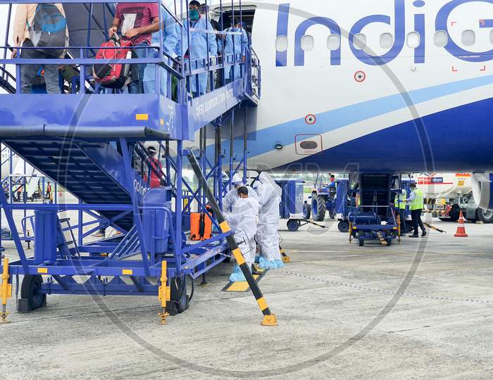 6Th June 2020- Bagdogra Airport,Siliguri, West Bengal, India-Indigo Airlines Cabin Crew Getting Dressed In White Protective Gear At Bagdogra Airport