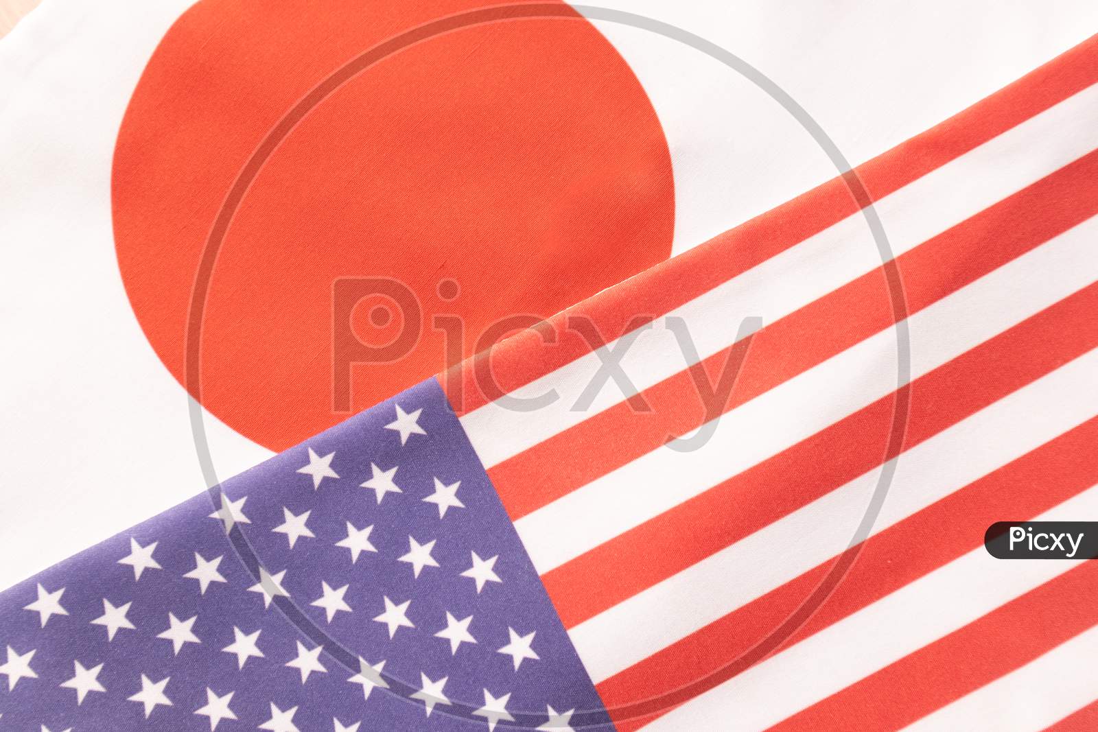 Concept Of Bilateral Relationship Between Two Countries Showing With Two Flags: The United States Of America And Japan