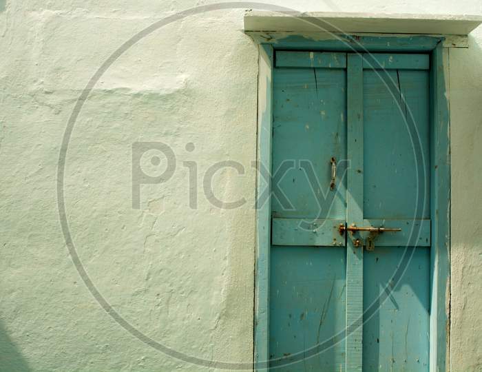 Traditional Old Wooden Door Of A House At Indian Rural Villages