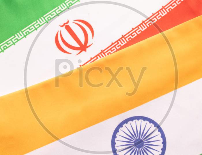 Concept Of Bilateral Relationship Between Two Countries Showing With Two Flags: India And Iran