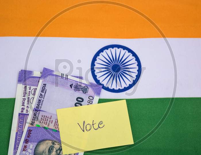 Political Corruption In India And Concept The Purchase Of Votes In Elections On Indian Flag.