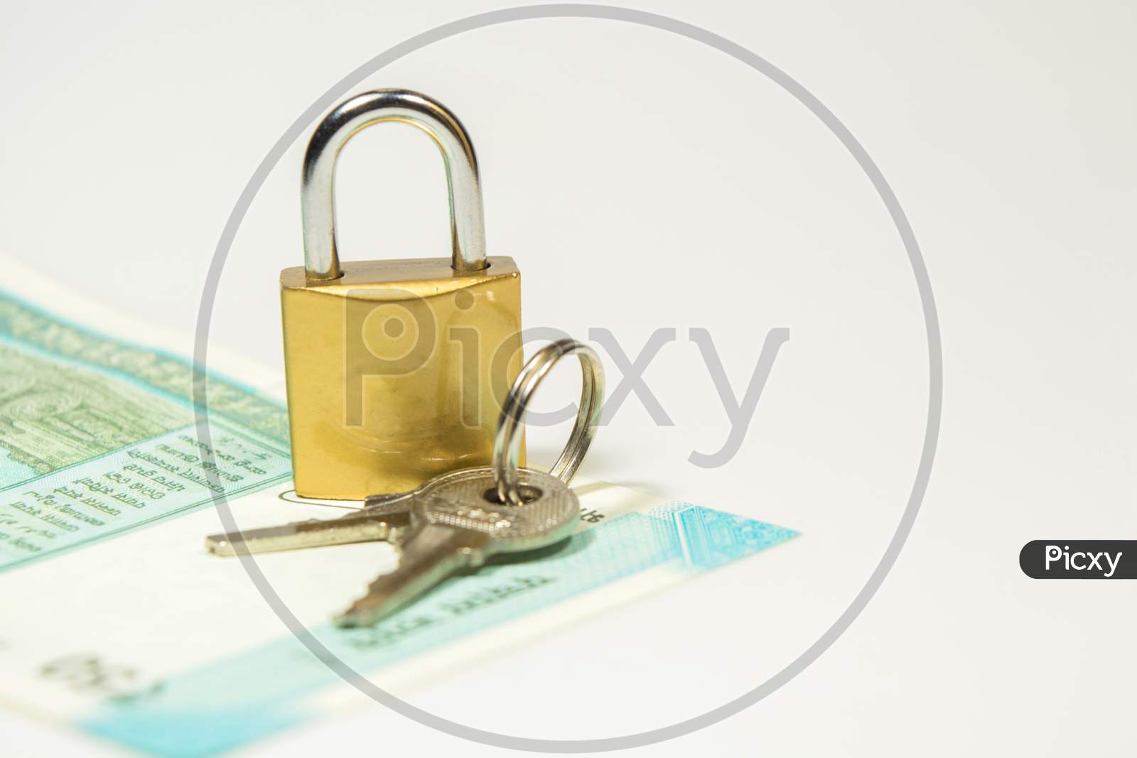 New 50 Rupees Indain Curency With Lock And Keys On Isolated White Background