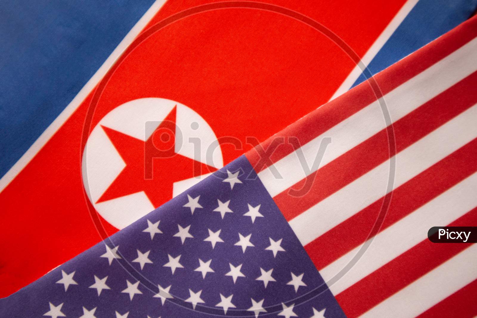Concept Of Bilateral Relationship Between Two Countries Showing With Two Flags: United States Of America And North Korea.