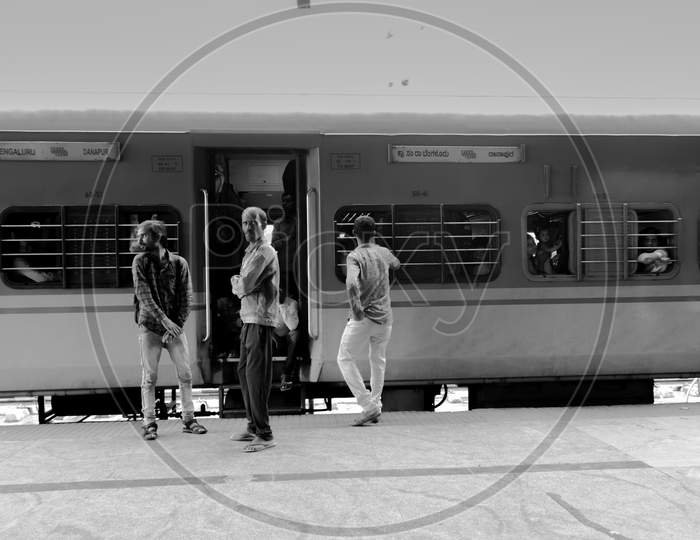 Bangalore India June 3, 2019 :Black And White Image Of People Outside The Train Waiting For The Train Movement