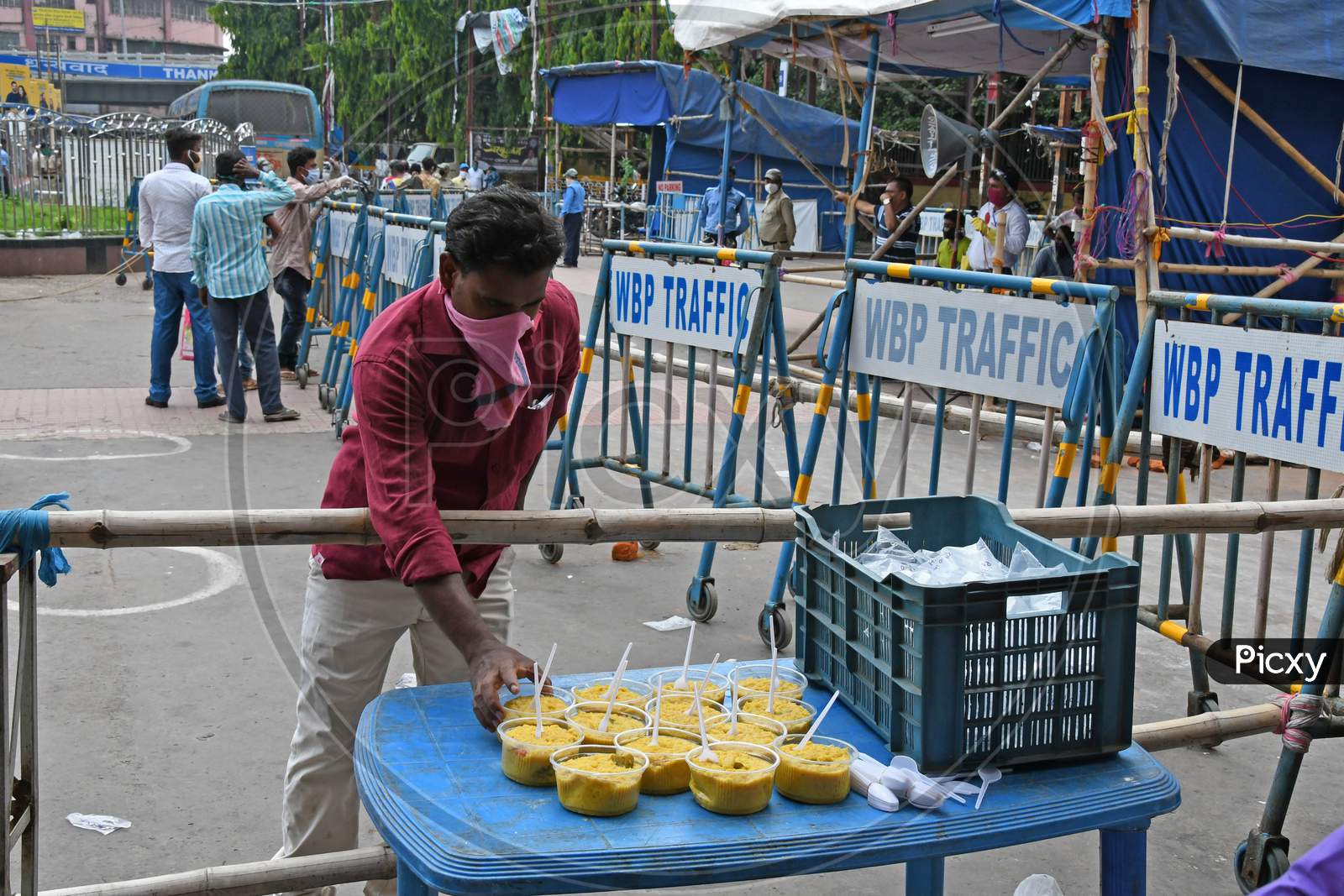 Migrant workers stranded in other states due to lockdown in the emergence of Novel Coronavirus (COVID-19) are being provided food by the Burdwan municipality after returning to their home states.