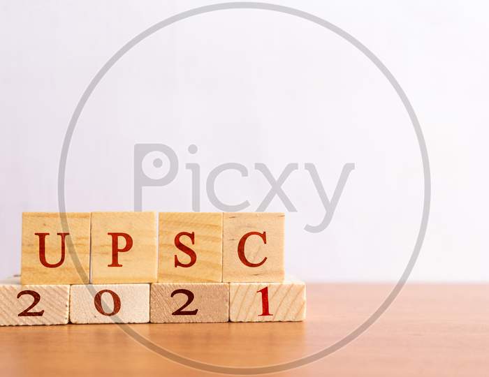 UPSC or  Union Public Service Comission Results In Wooden Block Letters.