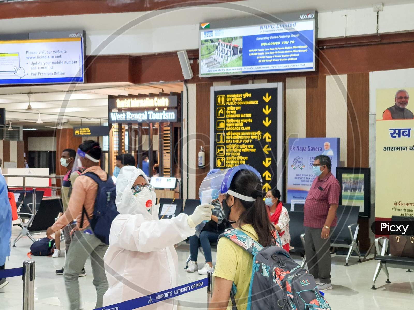 6Th June 2020- Bagdogra Airport,Siliguri, West Bengal, India-Passengers In Protective Gear Being Themal Scanned For Covid Screening By Airport Crew At Bagdogra Airport