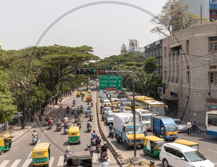 Bangalore, Karnataka India-June 04 2019 : Aerial View Of Green Traffic Light Or Signal With Moving Vehicle Near Town Hall Bengaluru, India