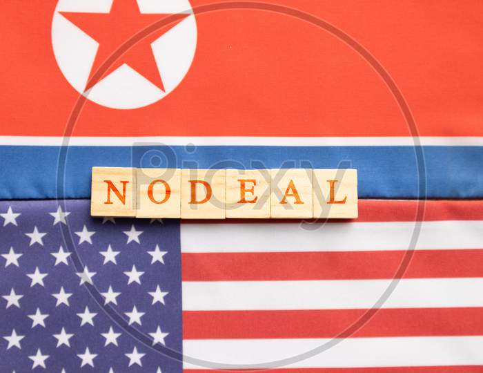 Concept Of Bilateral Relations Of Usa And North Korea Showing With Flag And Nodeal In Wooden Block Letters