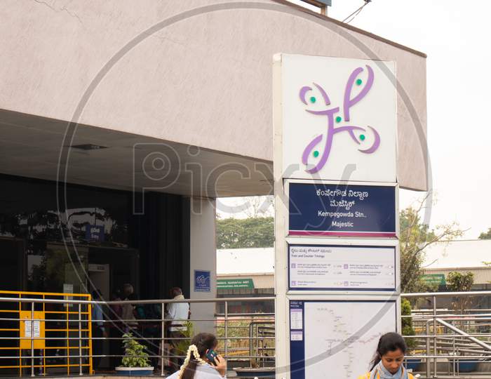 Bangalore, Karnataka, India June 02, 2019: People Using Mobile Outside The Kempegowda Metro Station Majestic Bengaluru Morning Time