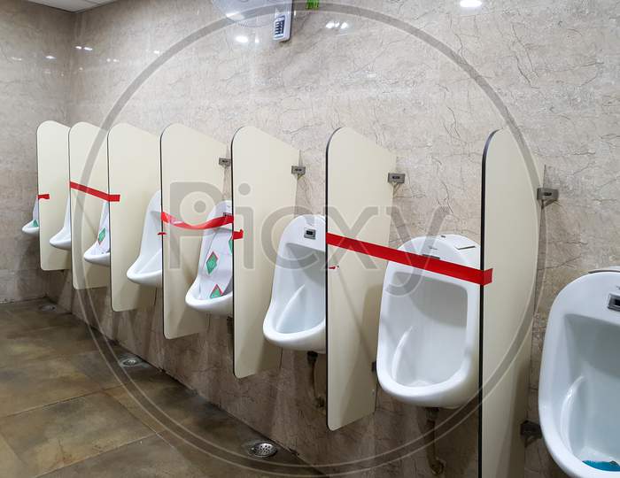 6Th June 2020- Bagdogra Airport,Siliguri, West Bengal,India - Adjacent Urinals Blocked To Maintain Social Distancing At Bagdogra Arport