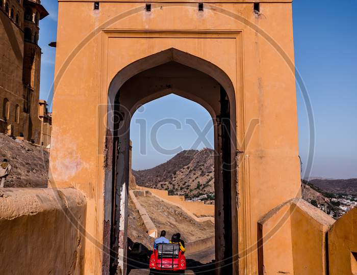 Tourists Are Enjoying The Small Car At The Famous Place Amber Fort In Jaipur, Rajasthan, India