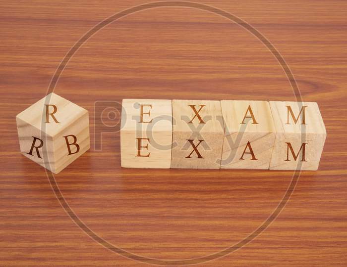 Concept Of Rrb Exam Conducted In India For Recruitment, Rrb Exam On Wooden Block Letters.