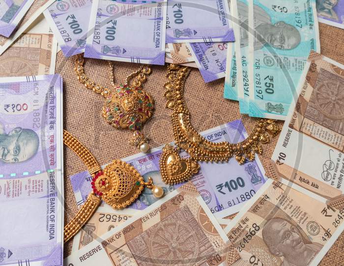 Concept Of Black Money, It Raid, Confiscated Or Unaccounted Money Showing Indian Currency Notes With Jewelry
