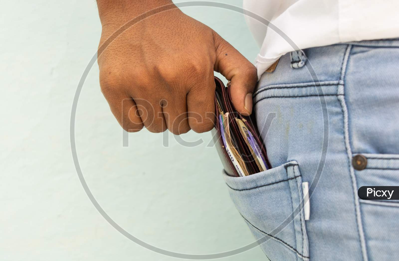 Closeup Of Man Hands Taking Taking Wallet Form His Pocket.